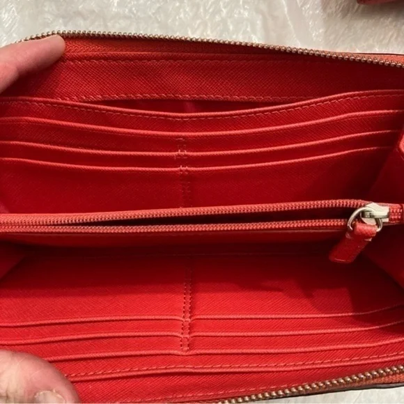 Coach orangy red leather double zipper wristlet clutch bag